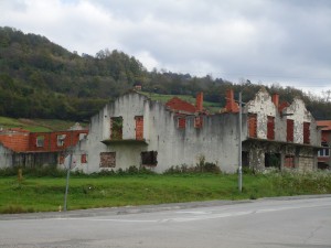 Houses abandoned and destroyed in an ethnically cleansed town on the way to the Srebrenica memorial.
