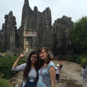 Caitlin with her language partner in the Stone Forest