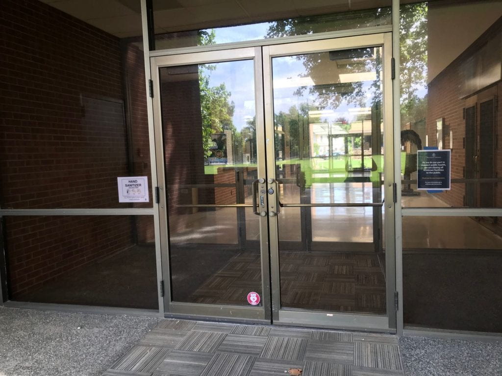 Glass doors at the entrance to Olin Hall