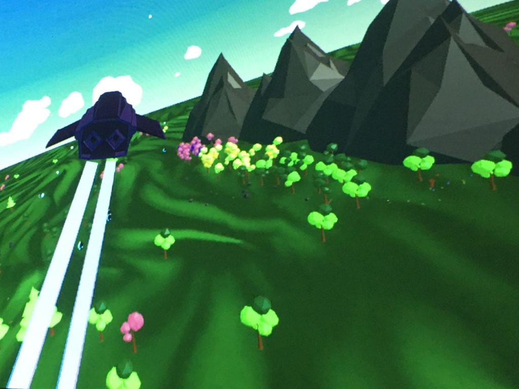 Fly the spaceship over a colorful terrain to beam up and collect cows.